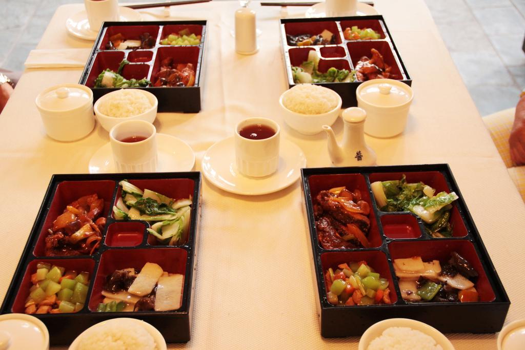 Wanbo Hotel Tam Á Ngoại thất bức ảnh